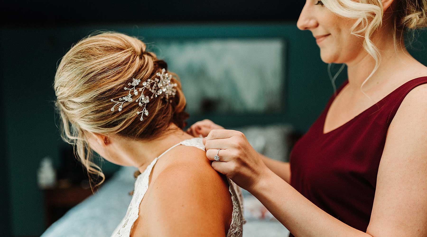 bride getting ready after bridal hairstyle morning of wedding