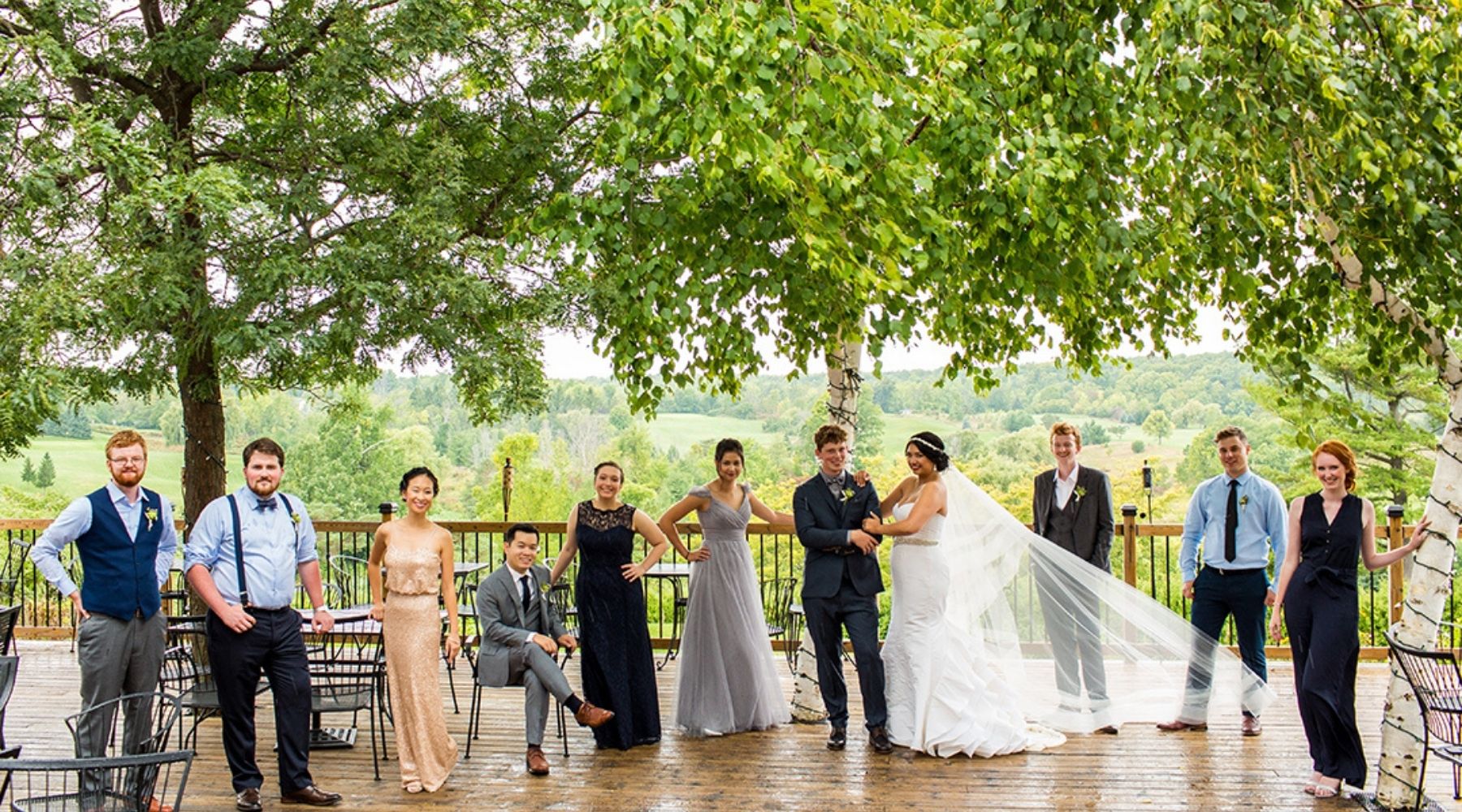 bride and groom dancing surrounded by guests