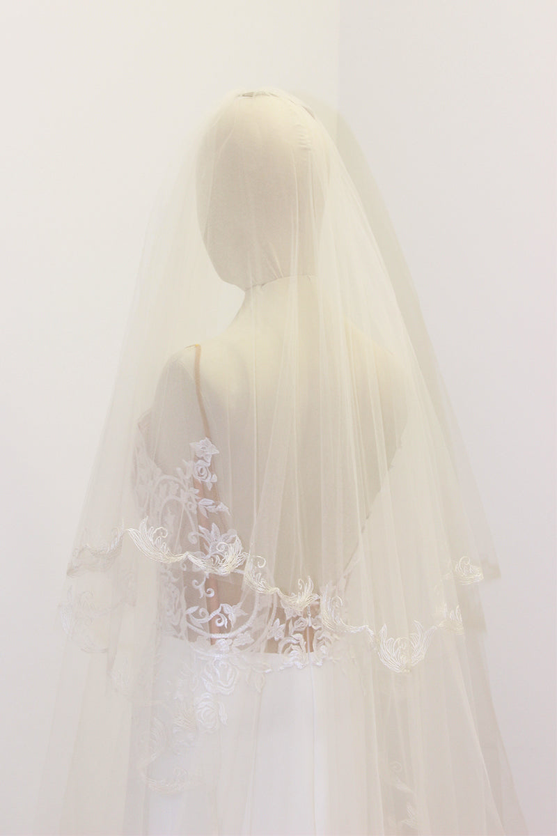 Laura Jayne Sydney enbroidered chapel veil on mannequin