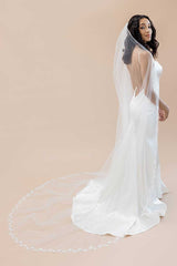 Full portrait of bride wearing nature-inspired embroidered cathedral veil Laurella by Laura Jayne Accessories Toronto