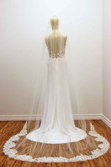 Make a statement, with this cathedral wedding veil featuring a train framed in a rich pattern of rose genuine French Alencon lace. Sheer light illusion flows effortlessly into the bold statement train to add a timeless modern sensuality to your w-day look