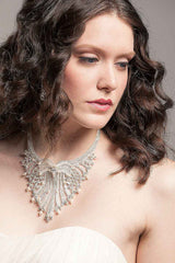 woman wearing beaded bib necklace