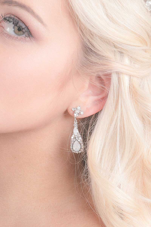 Close up of woman wearing opal chandelier wedding earrings E7026 by Laura Jayne Accessories