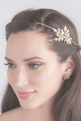 Woman wearing Filippa gold leaf hairvine by Laura Jayne Accessories
