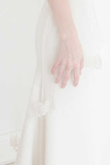 Close up view of the hand embroidered floral trim found at the bottom of Laura Jayne's Rosalie Mantilla Veil.