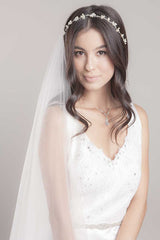 Bride wearing teardrop pearl crystal pendant N2113 by Laura Jayne Accessories