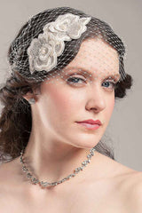 Gorgeous bridal hair comb featuring two 3D, lush embroidered blossoms with crystals, pearls and beads, nestled together on a metal wire tooth comb. Shown with bandeau face veil which is sold separately.