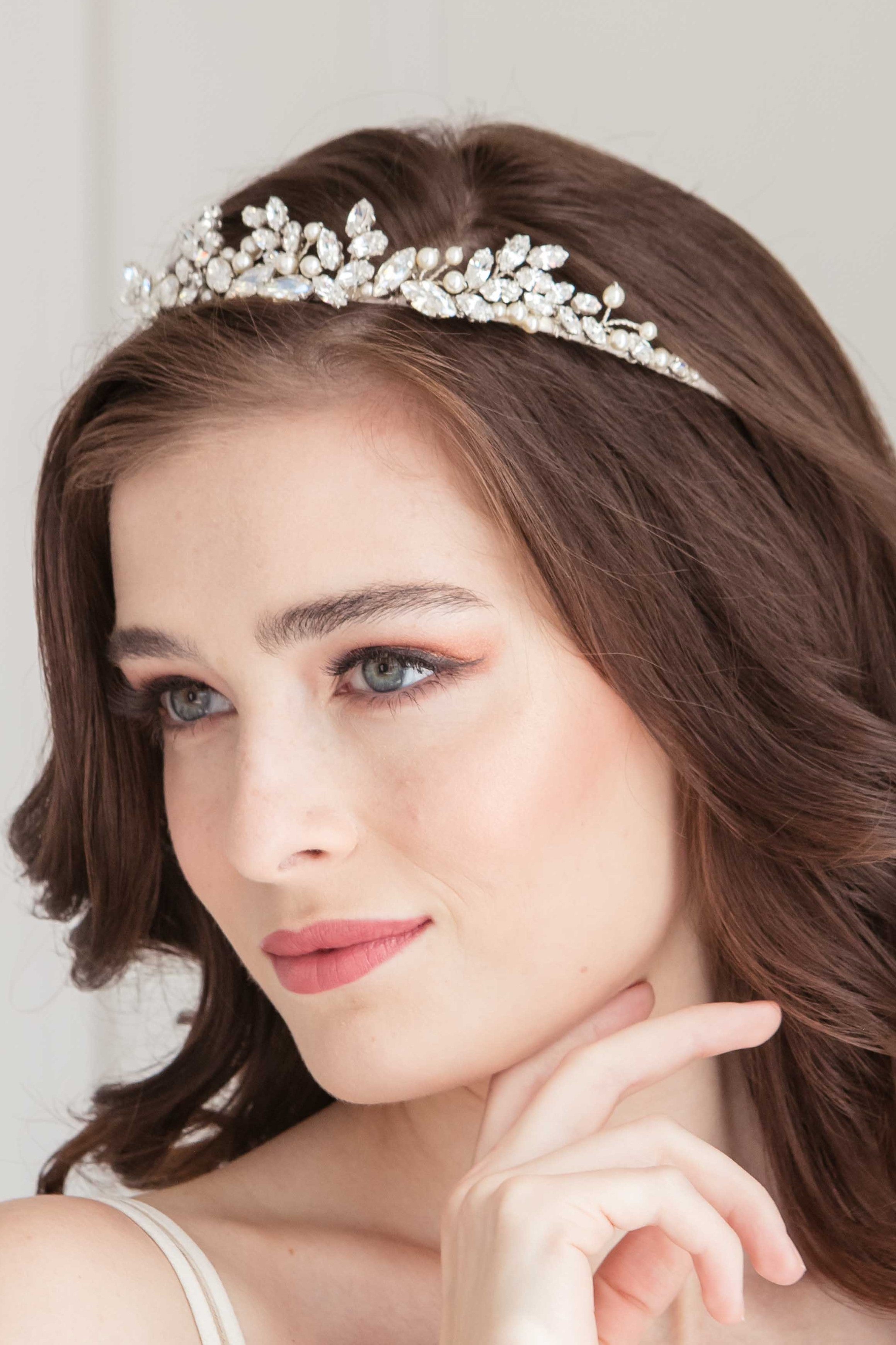 Closeup of bride wearing pearl and crystal bridal crown. Spryte Wedding Tiara. Handmade in Canada by Laura Jayne Accessories Toronto.