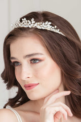 Closeup of bride wearing pearl and crystal bridal crown. Spryte Wedding Tiara. Handmade in Canada by Laura Jayne Accessories Toronto.