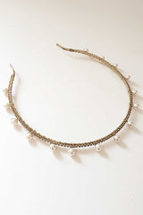 Closeup image of skinny headband with pearls and crystals. Syren Pearl Crystal Headband by Laura Jayne. Handcrafted in Toronto, Canada.