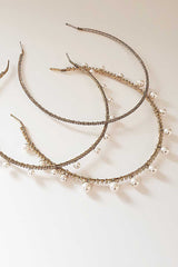 Image of skinny crystal headbands with and without pearls including Syren Pearl Crystal Headband. Handcrafted by Laura Jayne in Toronto, Canada.