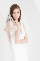 Bride wearing Peyton cathedral length mantilla wedding veil.