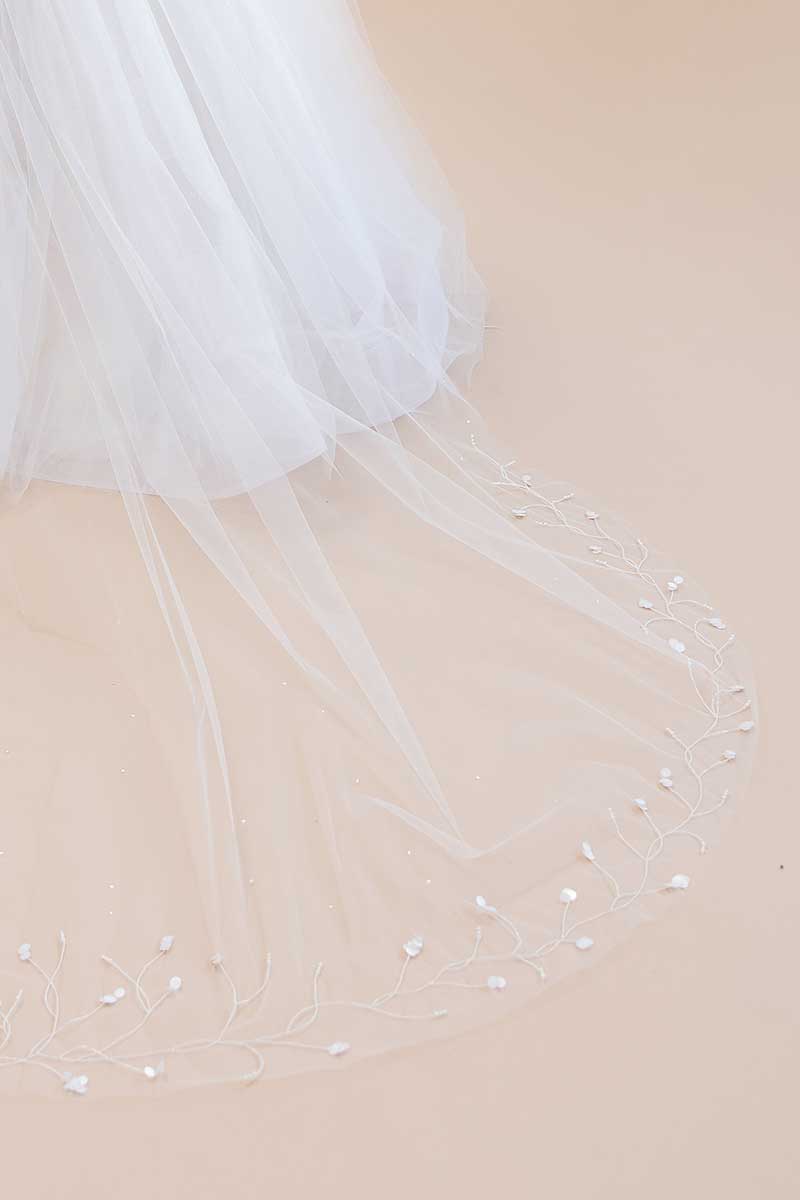 Close up of beaded detail and paillettes on Liliya Cathedral Veil from Laura Jayne Accessories Toronto.