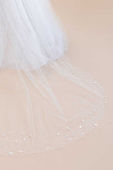 Close up of beaded detail and paillettes on Liliya Cathedral Veil from Laura Jayne Accessories Toronto.