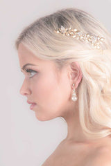 gold leaf hair comb on woman