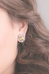 woman wearing cushion cut champagne crystal