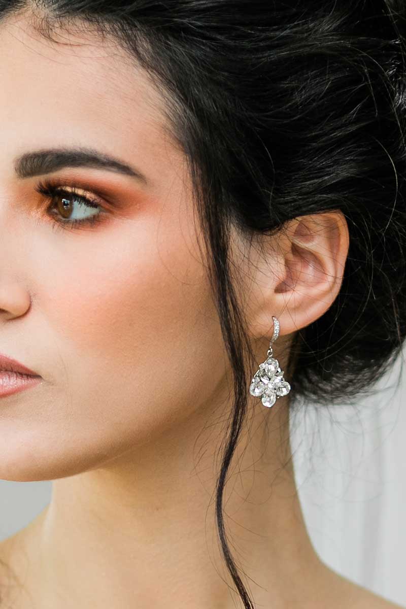 Profile of woman wearing crystal teardrop wedding earrings E4205 by Laura Jayne Accessories