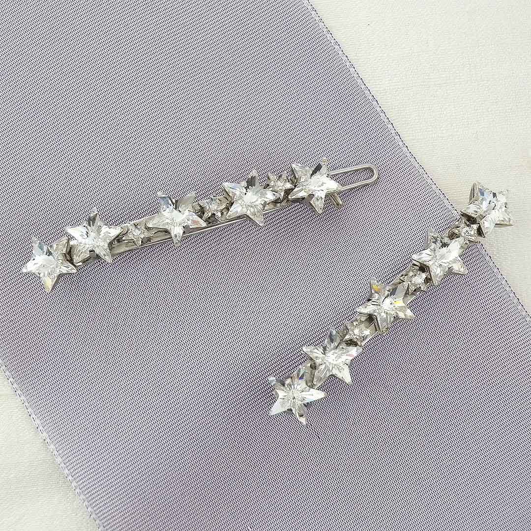 Pair of celestial crystal star barrettes by Laura Jayne Accessories