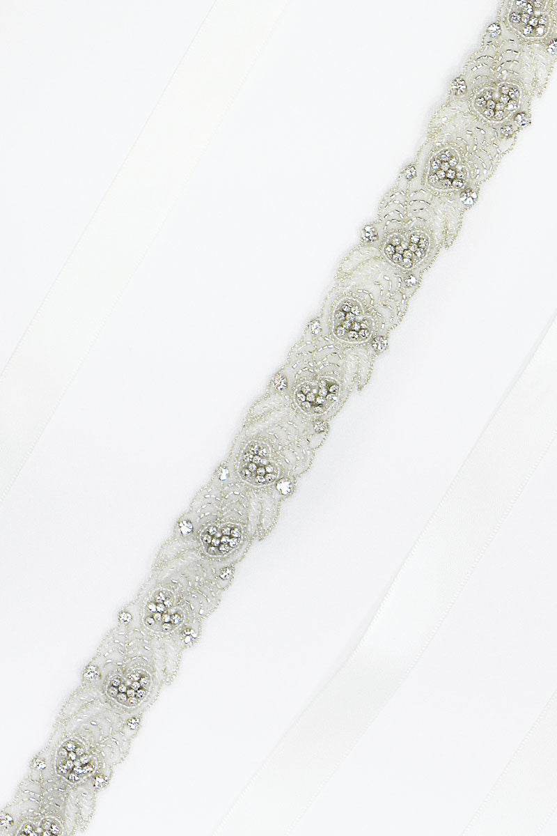 Detail of Laura Jayne silver leaf Verde sash