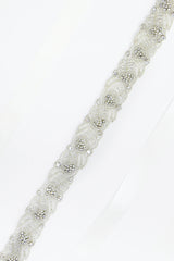 Detail of Laura Jayne silver leaf Verde sash