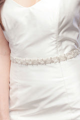 Laura Jayne Verde silver sash on woman's torso