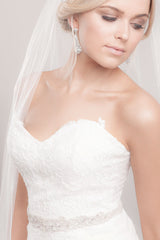 Bride wearing Trista gold leaf bridal sash by Laura Jayne Accessories