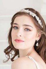 bride looking over shoulder wearing Alexia dimensional beaded headband by Laura Jayne Accessories