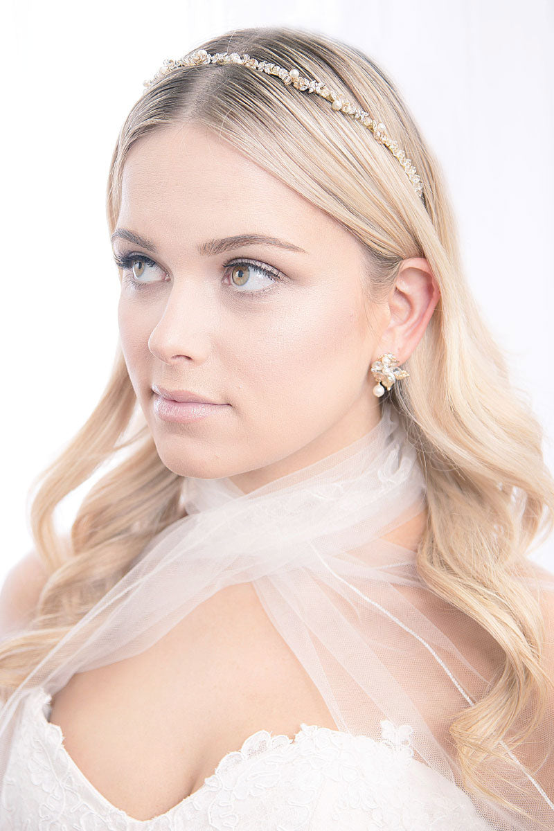 Head and shoulders of bride wearing gold champagne Sleek pearl, crystal & marquis crystal headband by Laura Jayne Accessories Toronto