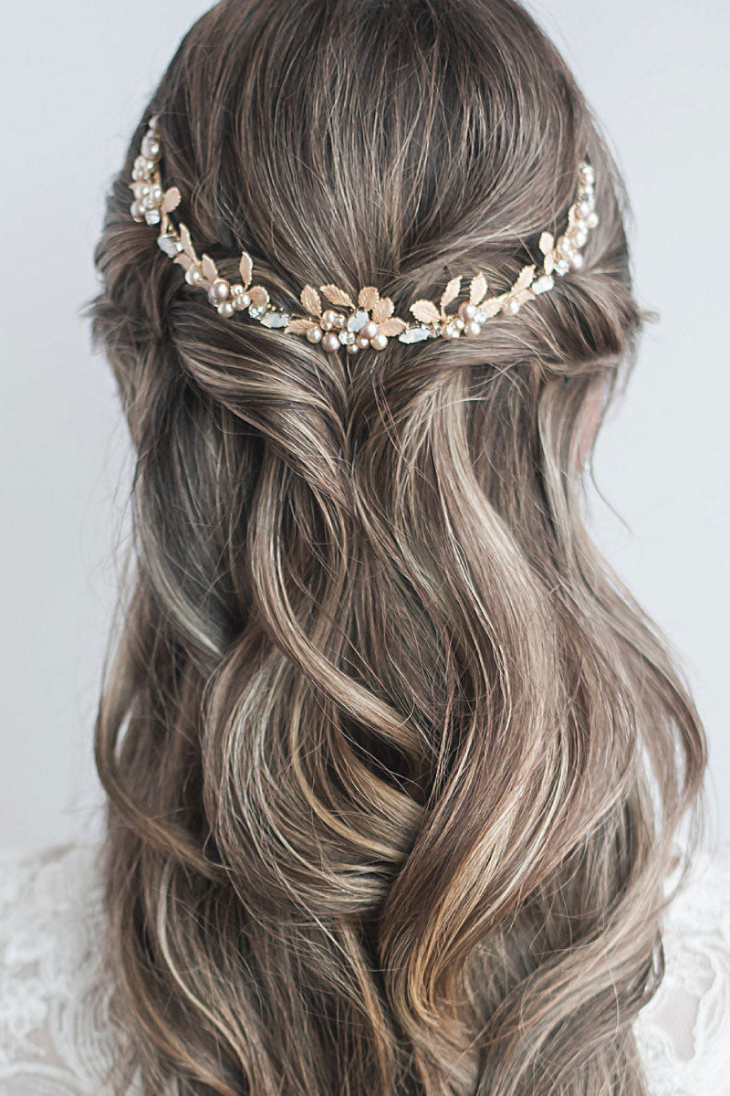 Back view of modern bride wearing hair half up half down with pearl and leaf tiara worn as a reverse crown. Bliss Leaf Pearl Tiara. Handcrafted in Canada by Laura Jayne Accessories Toronto.