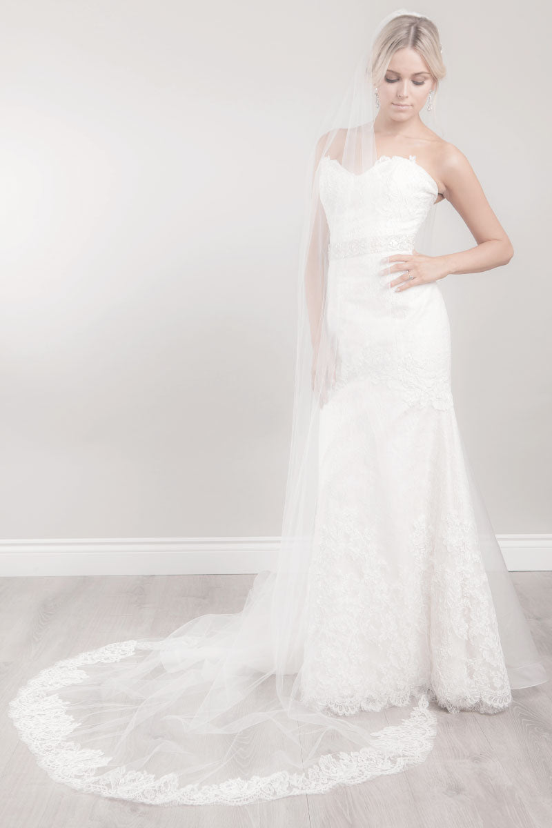 Bride wearing Chelsea rose lace cathedral veil by Laura Jayne Accessories Toronto