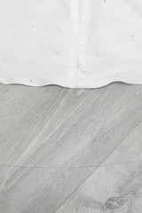 Close up view of "Love" crystal monogram along the bottom edge of the Cherish Crystal Cathedral Veil. Made in Canada by Laura Jayne Accessories Toronto.