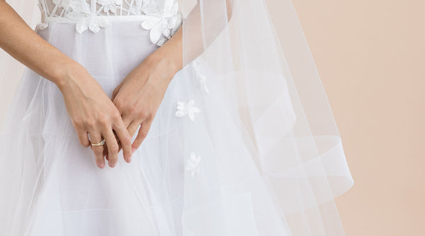 Modern bride wearing couture horsehair trim veil