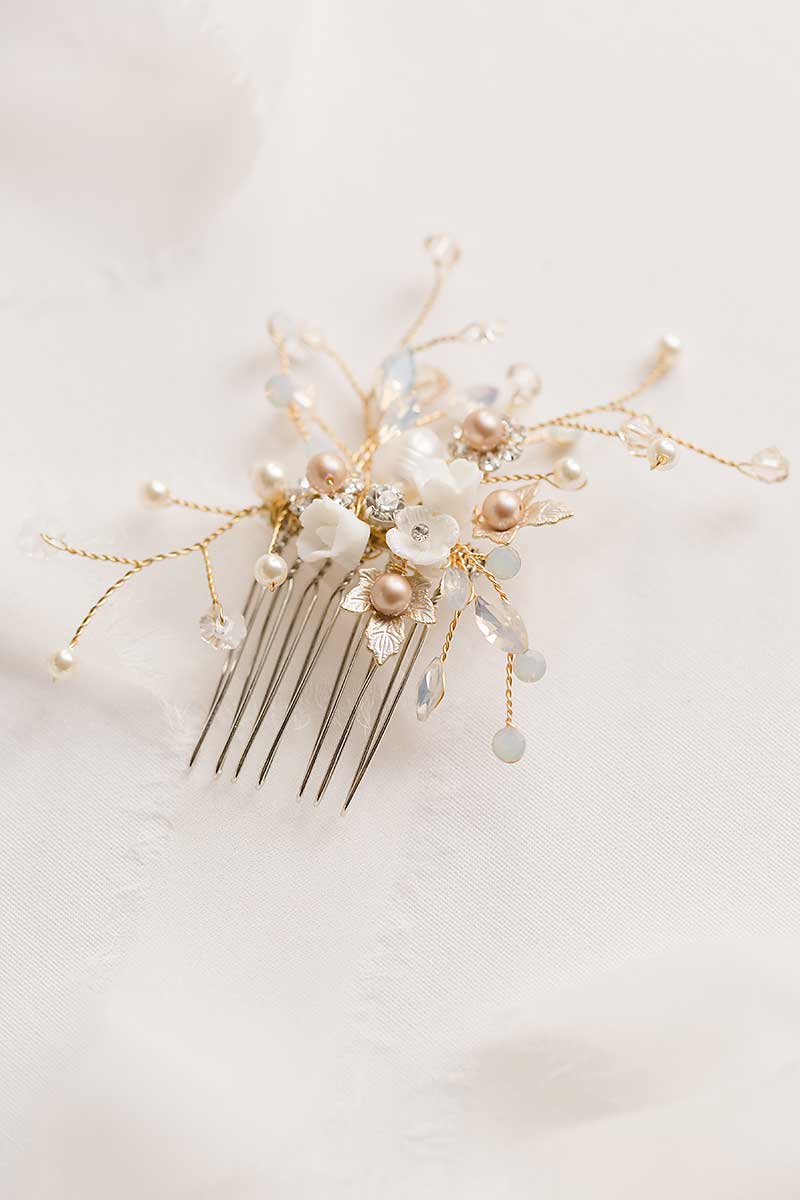 Louise gold wired floral hair comb on white background