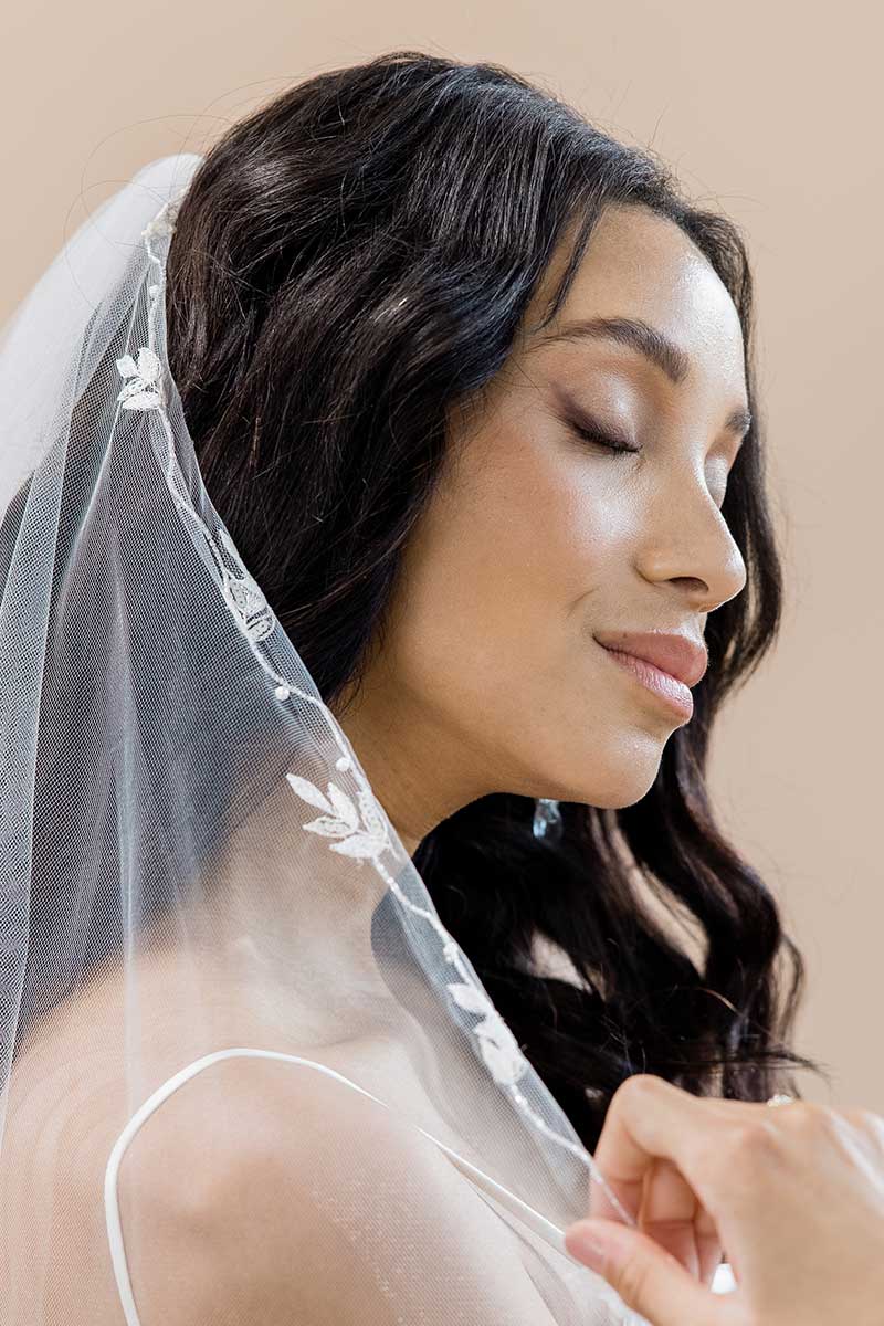 Close-up profile of bride wearing embroidered cathedral veil Laurella by Laura Jayne Accessories Toronto