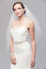 Bride wearing Laura Jayne Eustacia wedding sash