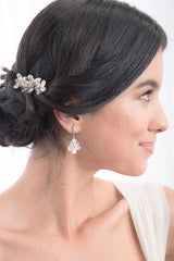 Profile of woman wearing Louisa crystal hairpins in updo hairstyle