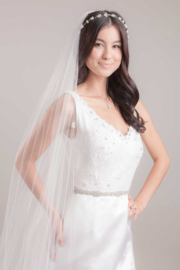 Side front view of bride wearing crystal rondelle wedding belt Maggie by Laura Jayne Accessories