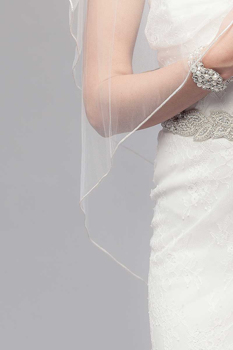 Close up image of metallic cord edge on Opulence Two Tier Fingertip Veil by Laura Jayne Accessories Toronto. Handcrafted in Canada.