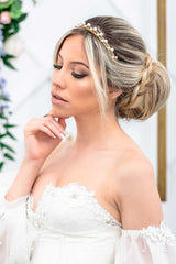 Modern bride wearing a stack of Laura Jayne skinny crystal bridal headbands with and without pearls including the Syrena Graduated Pearl Headband. Handmade in Toronto, Canada.