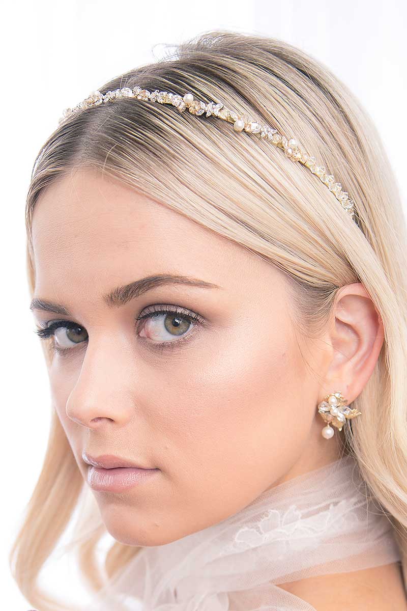 Front profile of woman wearing gold champagne Sleek pearl crystal CZ headband by Laura Jayne Accessories Toronto
