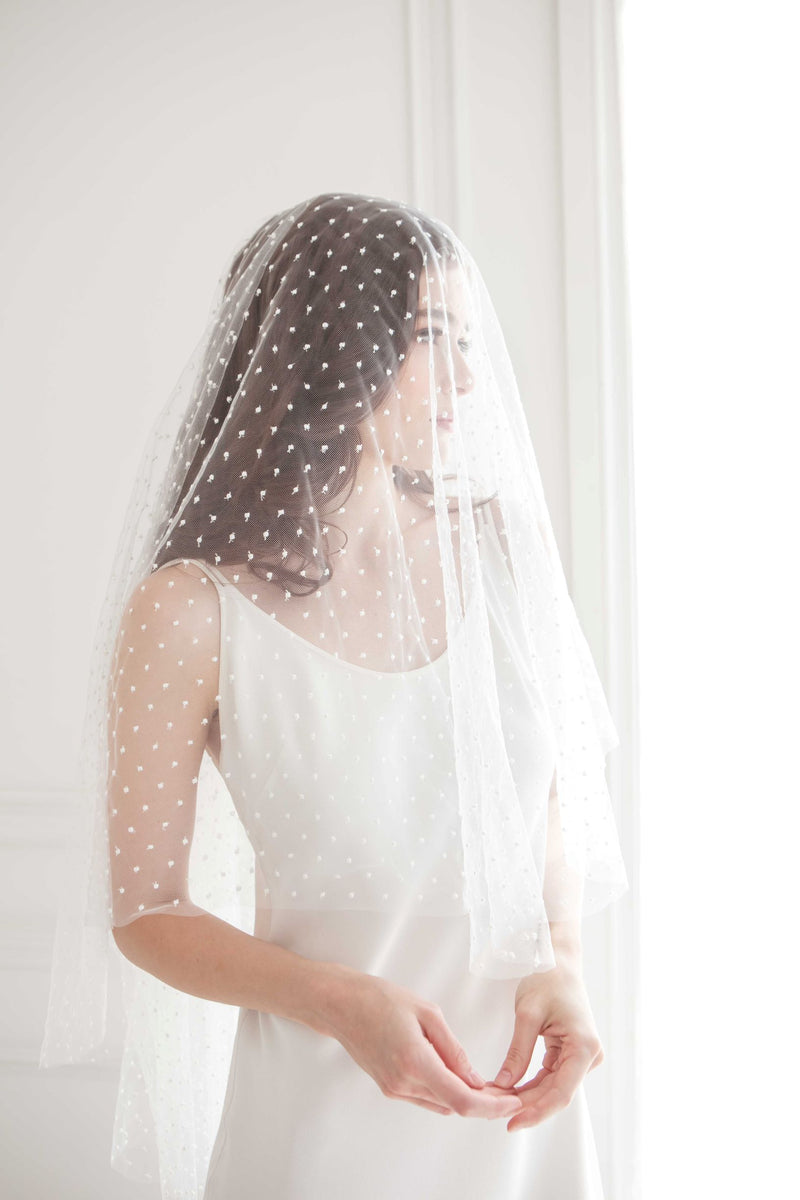 Toronto Bride in fingertip length polka dot veil. Handmade in Canada. Bridal Fashion Trend.