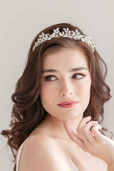 Bride wearing Spryte Wedding Tiara with pearl and crystal accents. Crown bridal accessory handcrafted in Toronto, Canada, by Laura Jayne. 