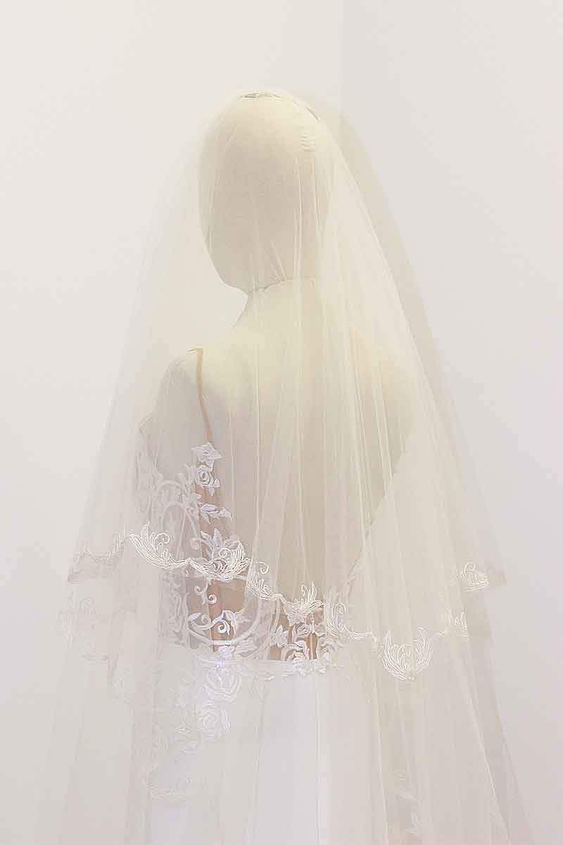 Laura Jayne Sydney enbroidered chapel veil on mannequin