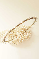 Top view of the Syren Pearl Crystal Headband. Skinny bridal accessory handmade in Canada by Laura Jayne Accessories Toronto.