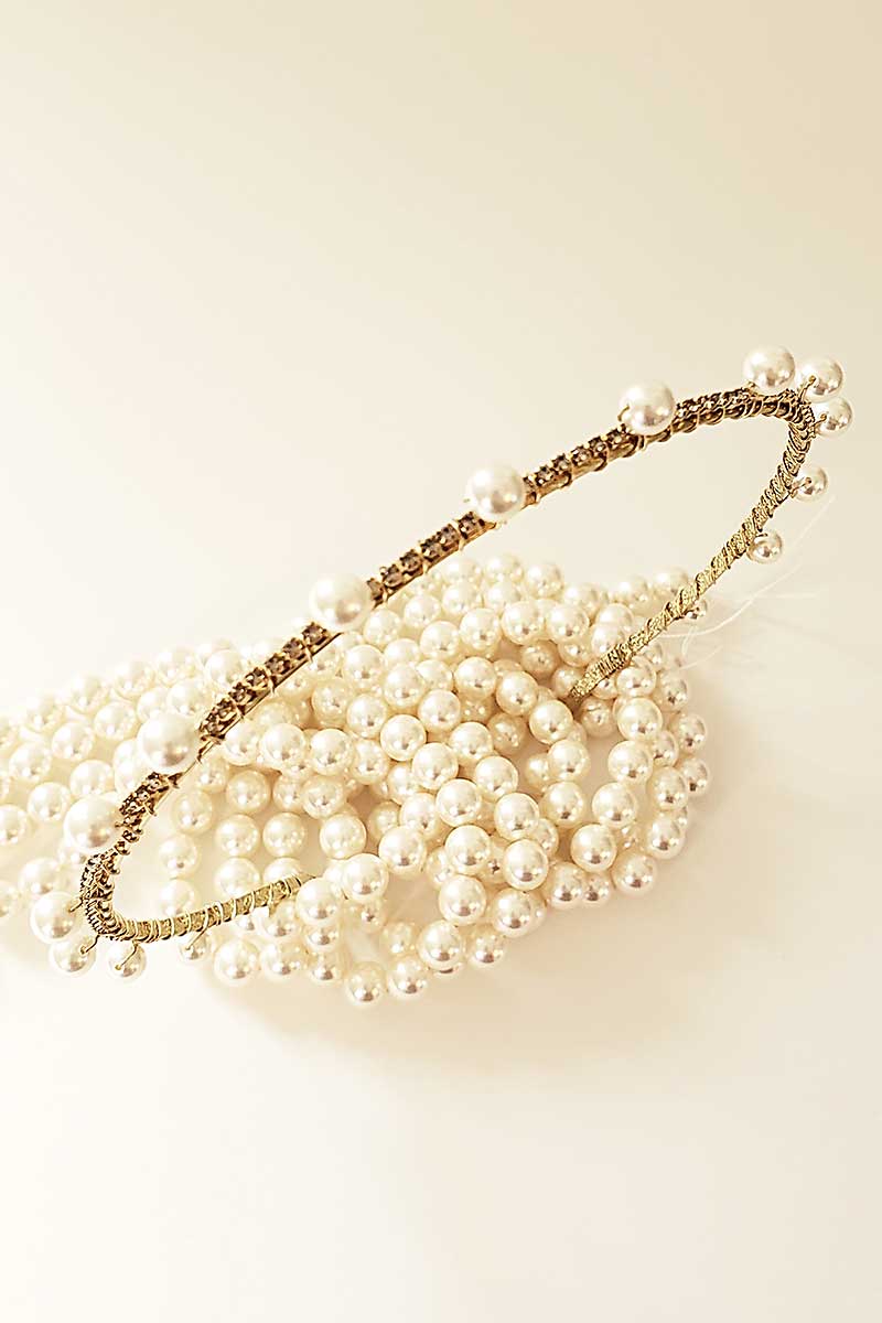 Top view of the Syren Pearl Crystal Headband. Skinny bridal accessory handmade in Canada by Laura Jayne Accessories Toronto.