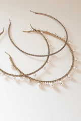 Image of skinny crystal headbands with and without pearls including Syren Pearl Crystal Headband. Handcrafted by Laura Jayne in Toronto, Canada. 