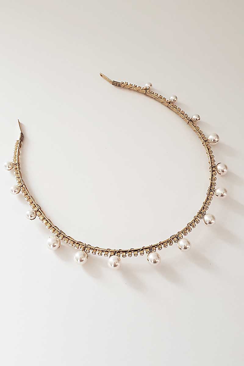 Closeup image of skinny headband with pearls and crystals. Syrena Graduated Pearl Headband by Laura Jayne. Handcrafted in Toronto, Canada.