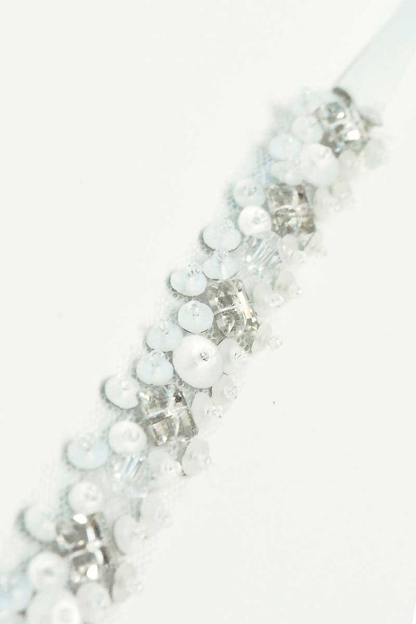 detail capture of Chelle crystal beaded hair ribbon in matte crystal by Laura Jayne Accessories
