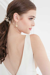 Woman profile with gold Marisol vine ponytail wrap