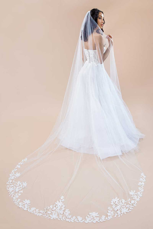 Full back view of romantic bride wearing cathedral veil with embroidered floral, pearl and crystal details. Nera 3D Flower Cathedral Veil by Laura Jayne Accessories Toronto. Handcrafted in Canada.